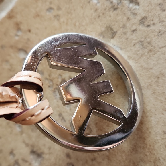 Michael Kors silver round purse charm on tan strap - Picture 6 of 7